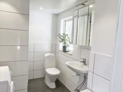 Ένα μπάνιο στο 4 star holiday home in VÄRMDÖ
