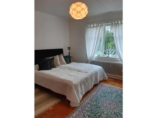 Ένα ή περισσότερα κρεβάτια σε δωμάτιο στο Holiday home with 3 bedrooms