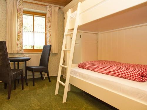 Ένα ή περισσότερα κρεβάτια σε δωμάτιο στο Guesthouse Trostelhof 1