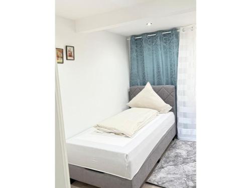 Ένα ή περισσότερα κρεβάτια σε δωμάτιο στο Holiday home on the banks of the Moselle