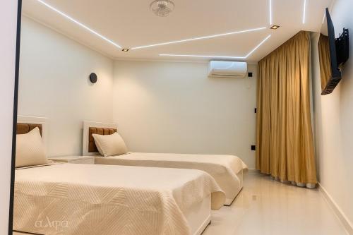 Ένα ή περισσότερα κρεβάτια σε δωμάτιο στο Modern Luxury Apartment 3 Min from Algiers Aiport
