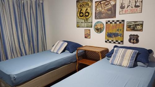 Ένα ή περισσότερα κρεβάτια σε δωμάτιο στο Condomínio Bell Recanto casa 15