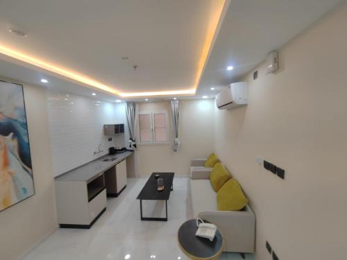 TV a/nebo společenská místnost v ubytování فندق الضيافة