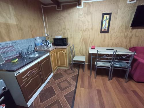 Η κουζίνα ή μικρή κουζίνα στο Cabañas Ross