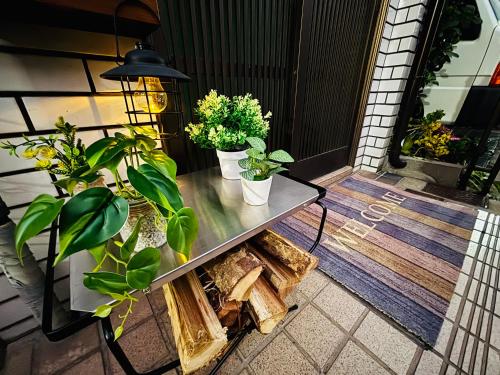 Ein Balkon oder eine Terrasse in der Unterkunft いちえ堂