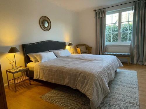 Ένα ή περισσότερα κρεβάτια σε δωμάτιο στο Rural idyll under thatched roof