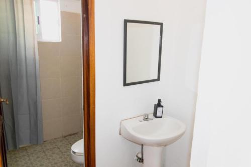 Phòng tắm tại Kaia Beach Hotel