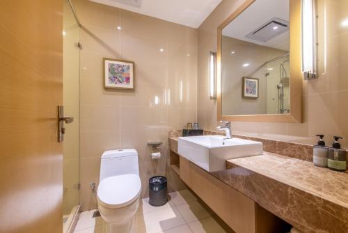 O baie la True Go Hotel - Guangzhou International Conference Center Memorial Hall Subway Station