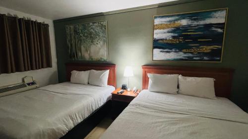 Cama o camas de una habitación en Nelson Hotel
