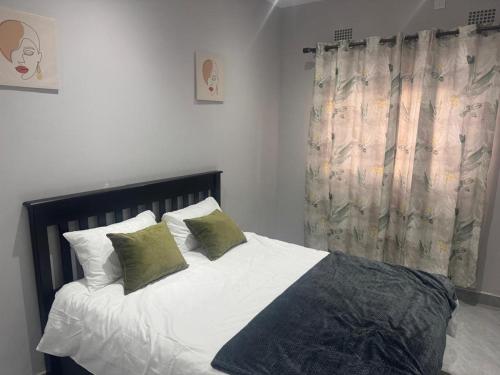 Ένα ή περισσότερα κρεβάτια σε δωμάτιο στο Bling apartments