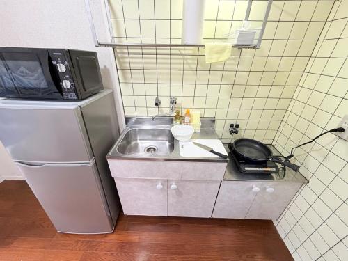 Køkken eller tekøkken på ハイツ緑ヶ丘102