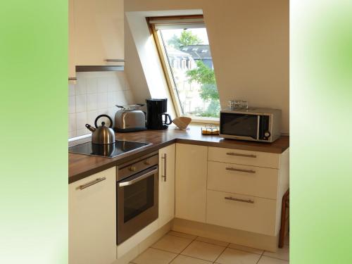 Kuchyň nebo kuchyňský kout v ubytování Ferienwohnung Weissbach