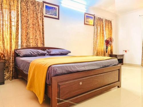 Giường trong phòng chung tại Royal Holiday Homes 4BHK premium Luxury Beach Villa, Uthandi
