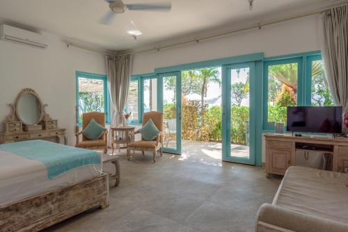 Ένα ή περισσότερα κρεβάτια σε δωμάτιο στο Mayo Resort