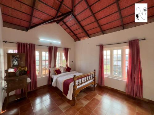 Postel nebo postele na pokoji v ubytování Grassland Voyages