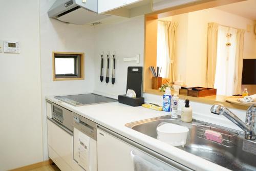 Private stay MIYAJIMA tonbo-AND