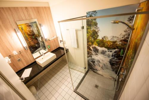 Ένα μπάνιο στο Livenwork Hotel & CoWorking GVZ Ingolstadt