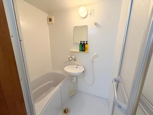 Et badeværelse på ハイツ清水205