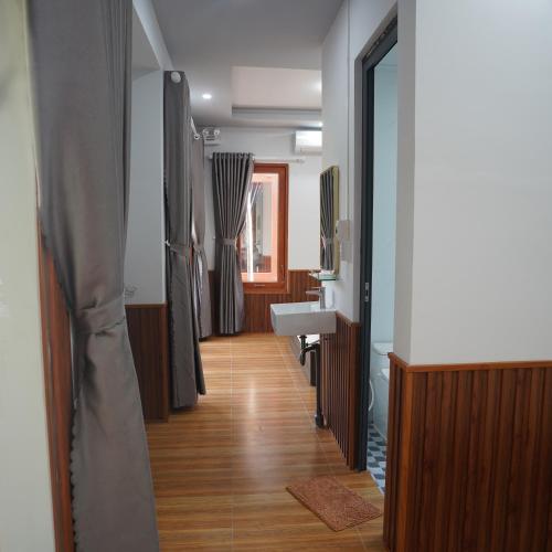 Giường trong phòng chung tại Homestay - Villa Ông Đề