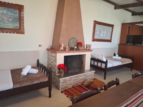 Posezení v ubytování Karofillos homes-Oropedio