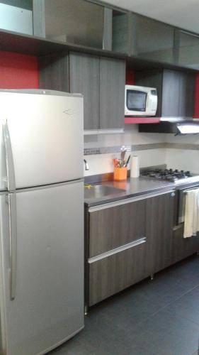 A cozinha ou cozinha compacta de Apartamento En Sabaneta