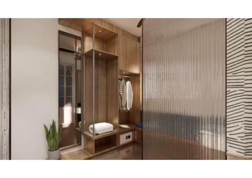a bathroom with a mirror and a sink in it at Hotel Serenity Suites in Nagpur