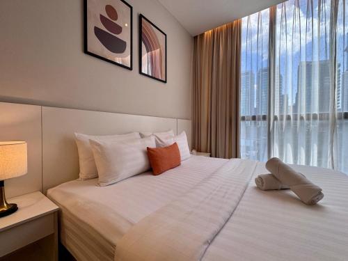 Ένα ή περισσότερα κρεβάτια σε δωμάτιο στο NEW Bangsar Trade Centre KL Mid Valley LRT Bangsar