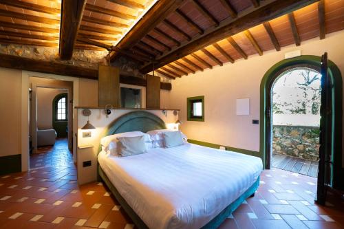 Ένα ή περισσότερα κρεβάτια σε δωμάτιο στο Borgo San Luigi