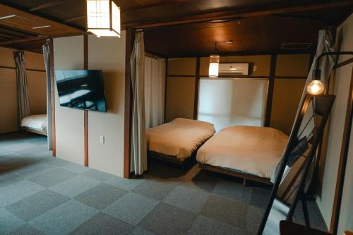 Imagen de la galería de chidori4 伝統的な銭湯の上にある宿広々空間 銭湯無料体験 西九条駅 千鳥橋 USJ, en Wada