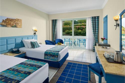 Ένα ή περισσότερα κρεβάτια σε δωμάτιο στο Dreams Vacation Resort - Sharm El Sheikh