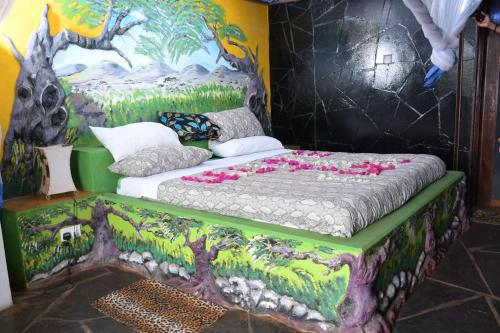Ένα ή περισσότερα κρεβάτια σε δωμάτιο στο Shimba Green Lodge