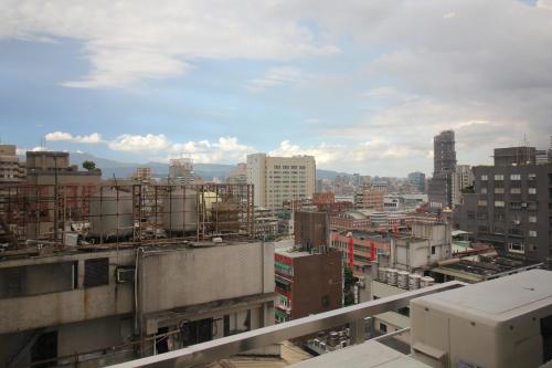a view of a city skyline with buildings at I Play Inn TP in Taipei