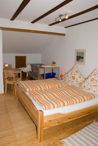 a bedroom with a large bed in a room at Ferienhaus Schanze19 in Schmallenberg