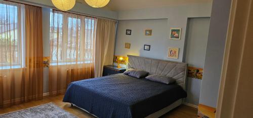 Llit o llits en una habitació de Villa Jumbo