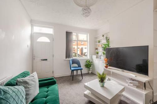 TV a/nebo společenská místnost v ubytování Ridley Premium Stay