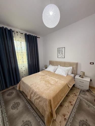 Llit o llits en una habitació de Happy Home