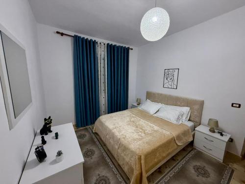 Llit o llits en una habitació de Happy Home