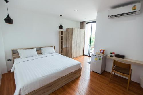 Ένα ή περισσότερα κρεβάτια σε δωμάτιο στο THAMM Residence