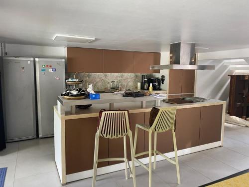 Kuchyň nebo kuchyňský kout v ubytování Maison dans un cadre paisible