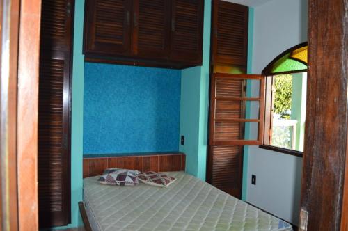 Postel nebo postele na pokoji v ubytování Casa de Junqueira Mangaratiba