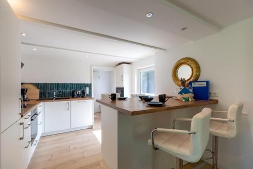 Hồ bơi trong/gần Ferienhaus DeichKate