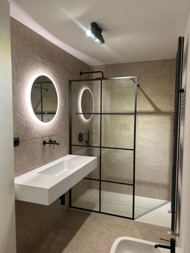 a bathroom with a sink and a shower at Casa Camas, wide 2bedroom, feel the mountain in Breuil-Cervinia