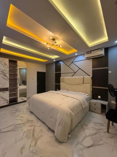 Ένα ή περισσότερα κρεβάτια σε δωμάτιο στο Quantum Havens Apartment - EKO