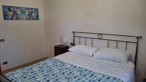 Postel nebo postele na pokoji v ubytování Casa Oliva