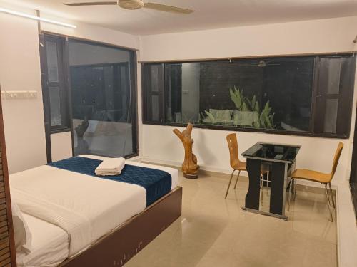 Ένα ή περισσότερα κρεβάτια σε δωμάτιο στο Mia Riaan Lake View Resort