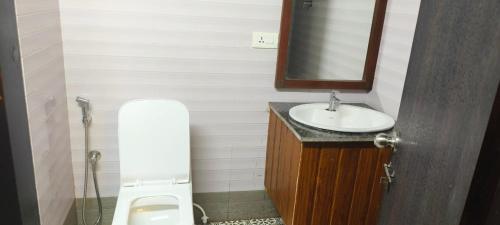 Ένα μπάνιο στο Mia Riaan Lake View Resort