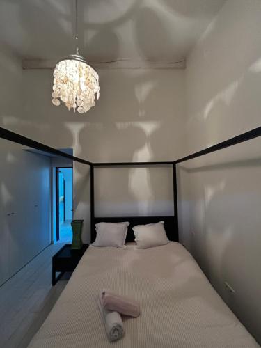 Ένα ή περισσότερα κρεβάτια σε δωμάτιο στο Villa Rose Pool Sea View Super Cannes