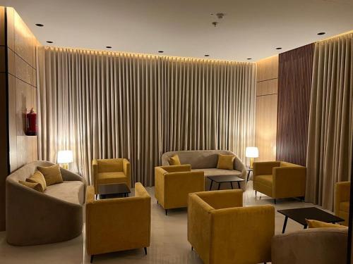 Χώρος καθιστικού στο Jawel Crown Hotel Apartments- تاج الجوهرة للشقق الفندقية