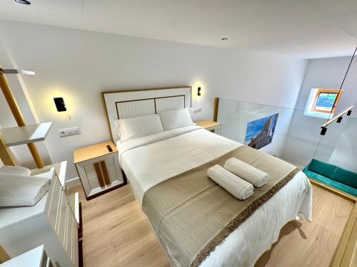 Ένα ή περισσότερα κρεβάτια σε δωμάτιο στο Premium Plaza San Cristóbal - Gran Vía Centro