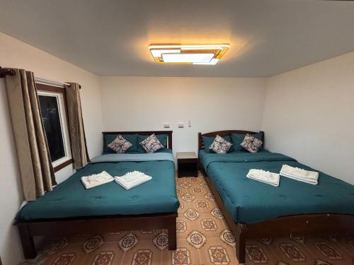 Ένα ή περισσότερα κρεβάτια σε δωμάτιο στο Alanta aonang resort